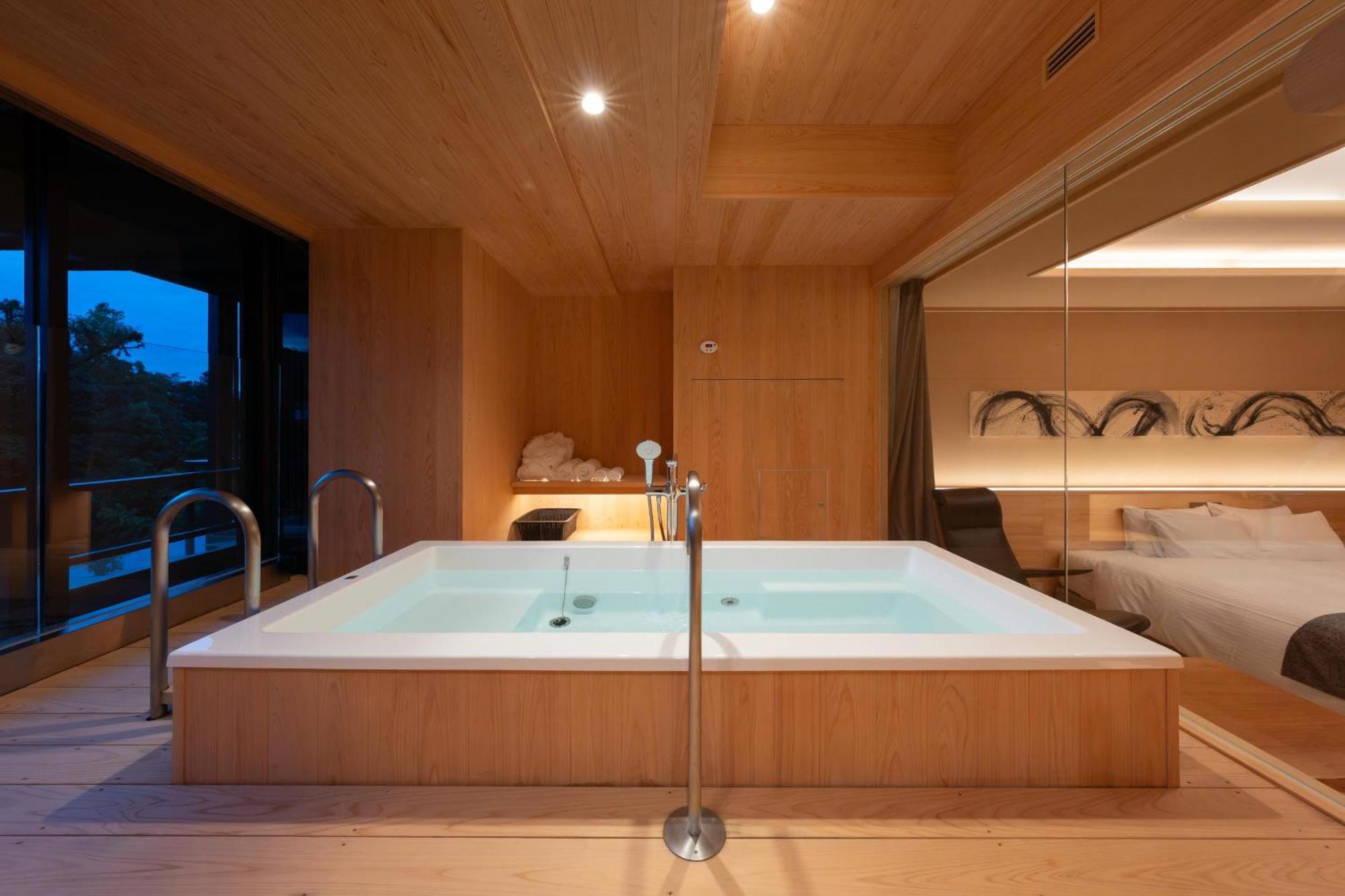Chambre Lit King-Size avec Baignoire Spa
